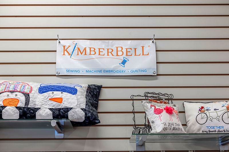 kimberbell sign with embroidery projects below