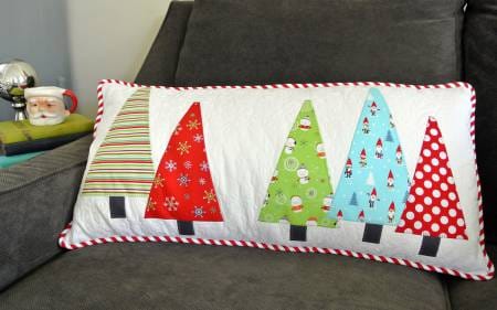 throw pillow with christmas trees appliqued